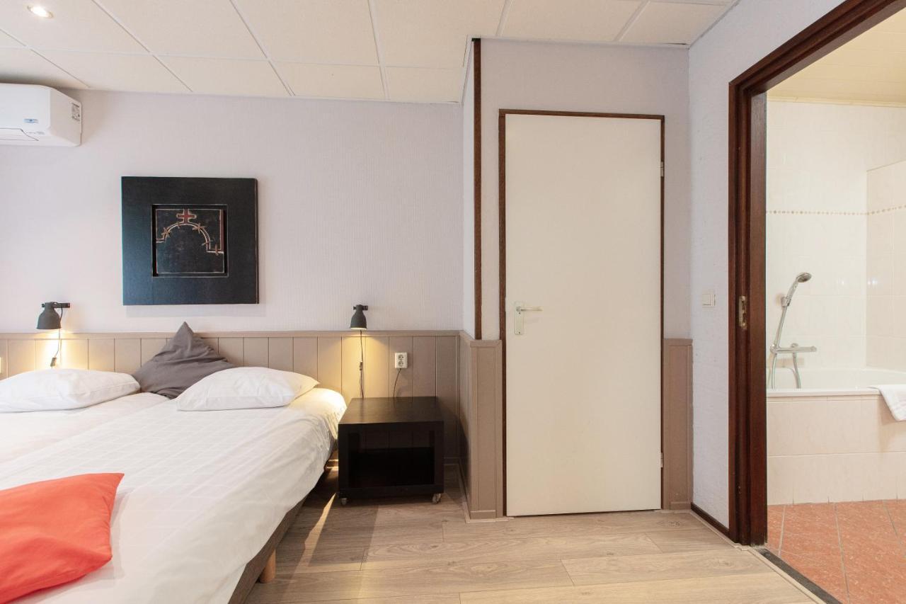 Aparthotel Делден Стая снимка
