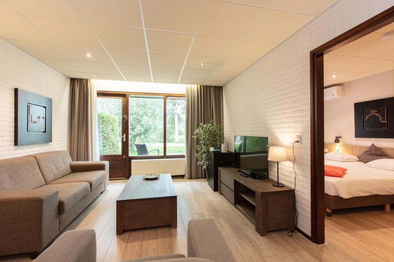 Aparthotel Делден Стая снимка